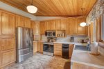 Chase`s cabin kitchen with hardwood cabinets. 